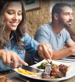 Woman eating dinner