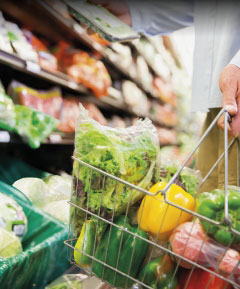 Shopping basket with food in it