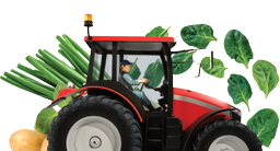 A red tractor with vegetables behind it