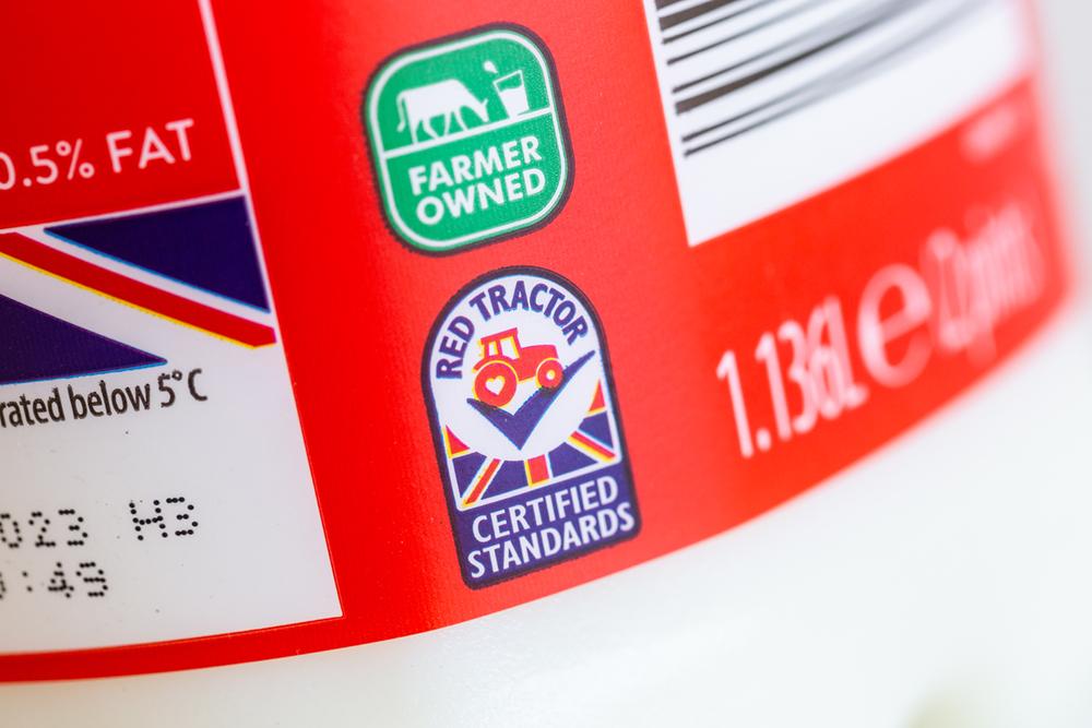 Red tractor logo on a bottle of milk